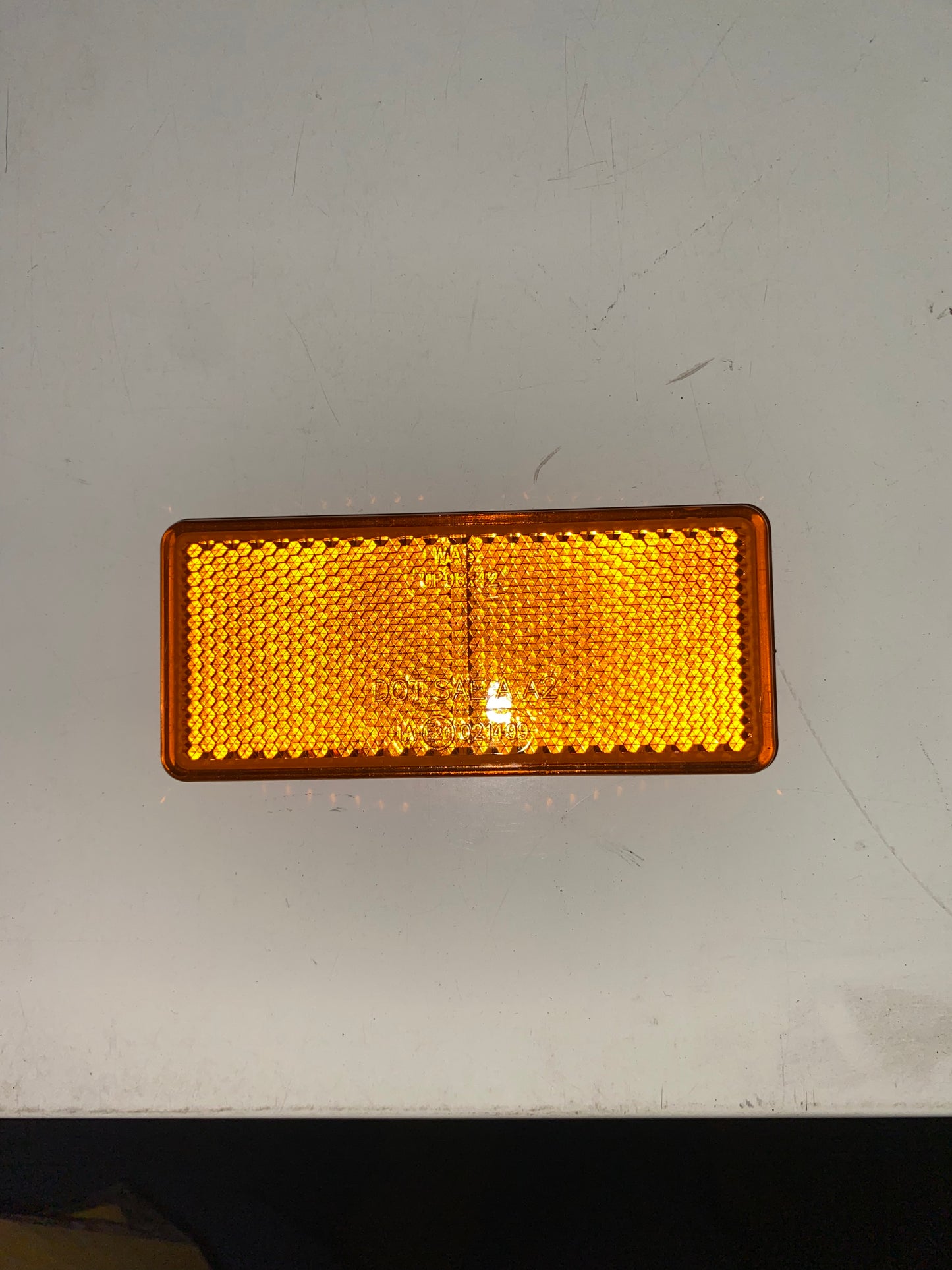 Self adhesive orange reflector
