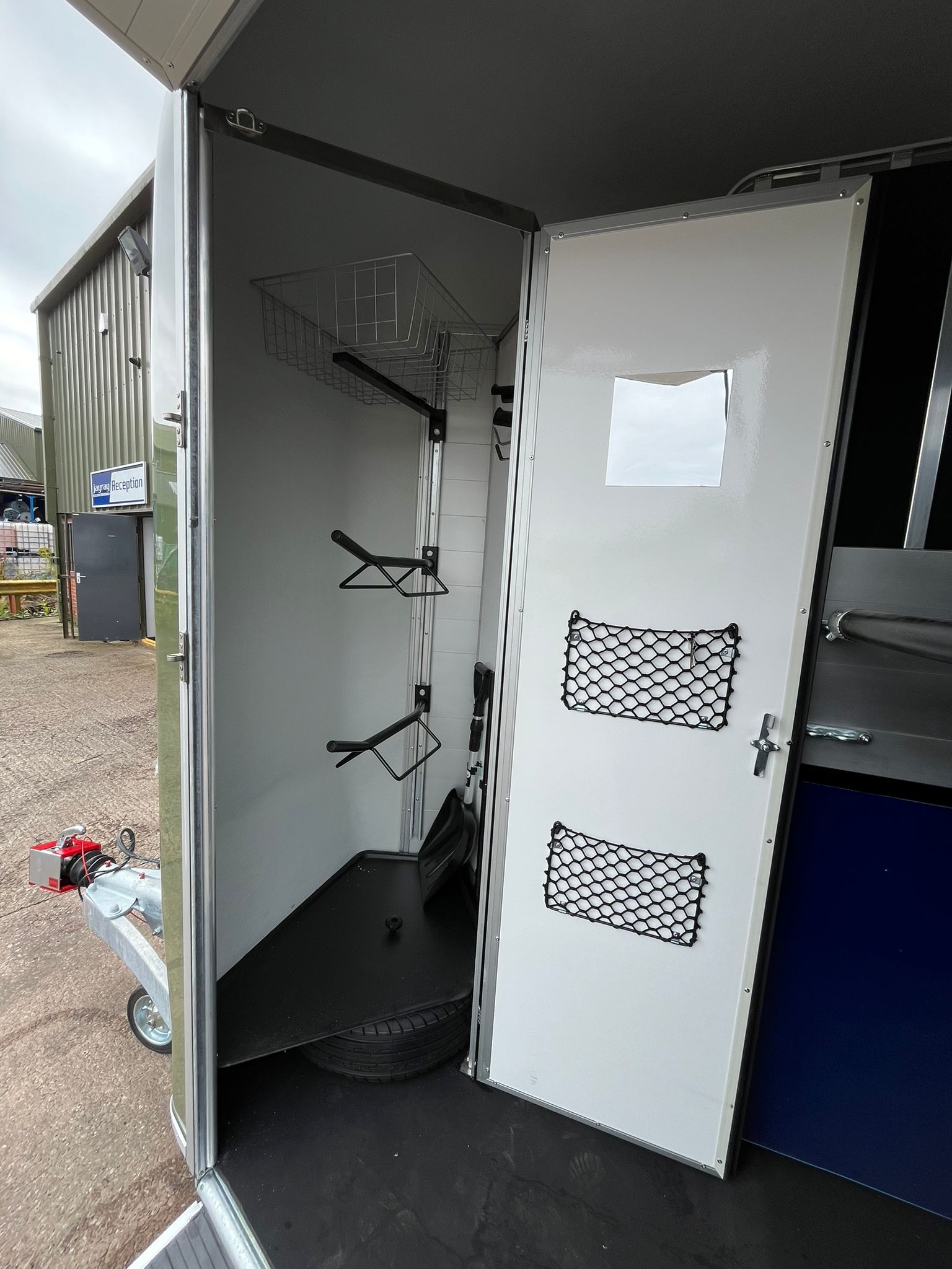 Interior of Cheval Liberté Touring Country Trailer with Tack Room and Saddle Hooks