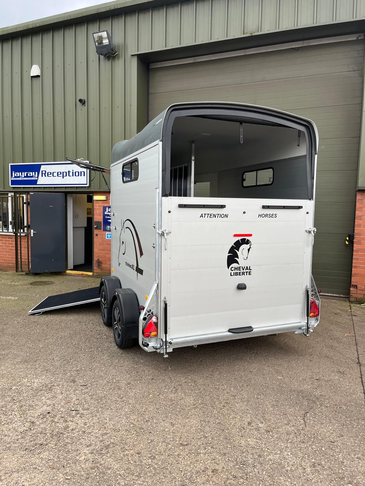 Rear Ramp of Cheval Liberté Touring XL Horse Trailer with High Level Brake Light And Aero-Roller