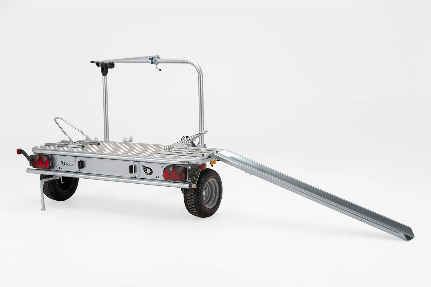 Debon MOTO COMPACT trailer with ramp tilted down for bike loading