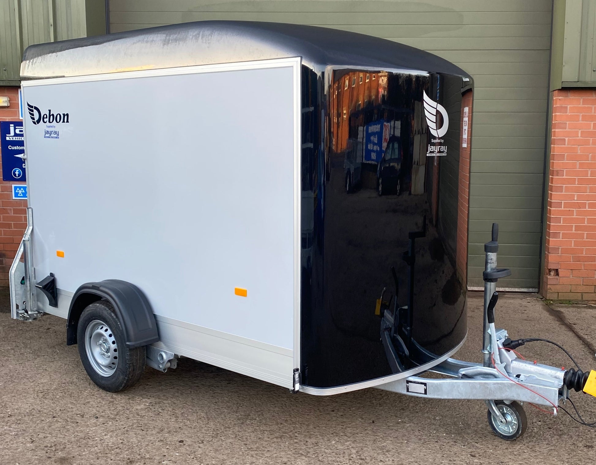 Debon C300 Box Van Trailer Front Corner View in Black with Composite Sides