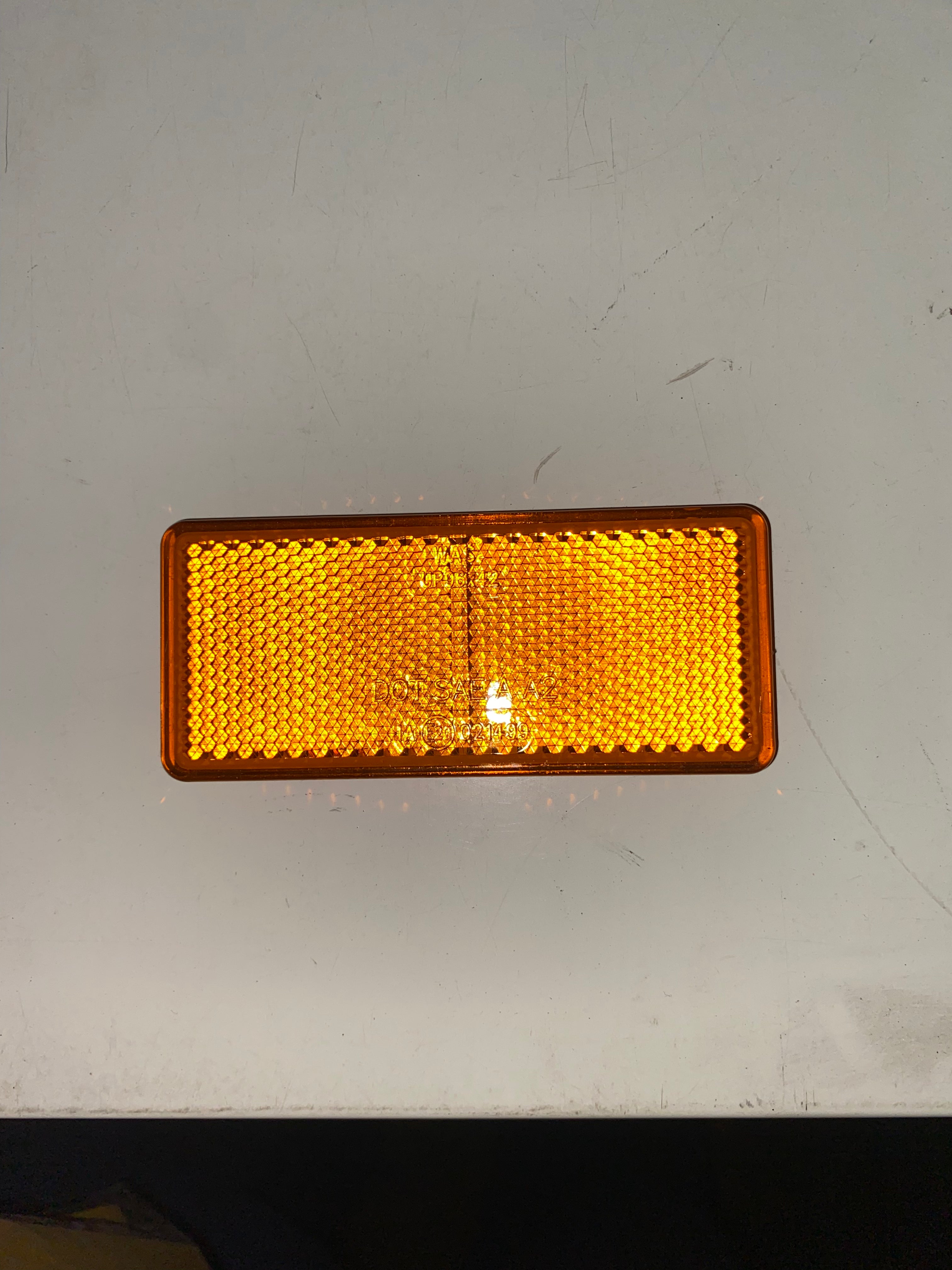 Self adhesive orange reflector