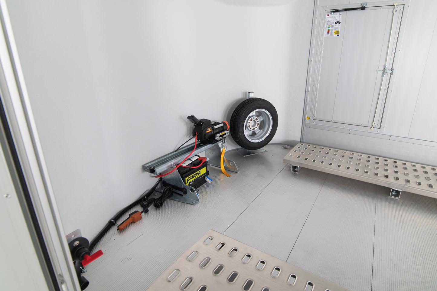 Electric winch fitted with alloy spare wheel mounted. Both optional extras