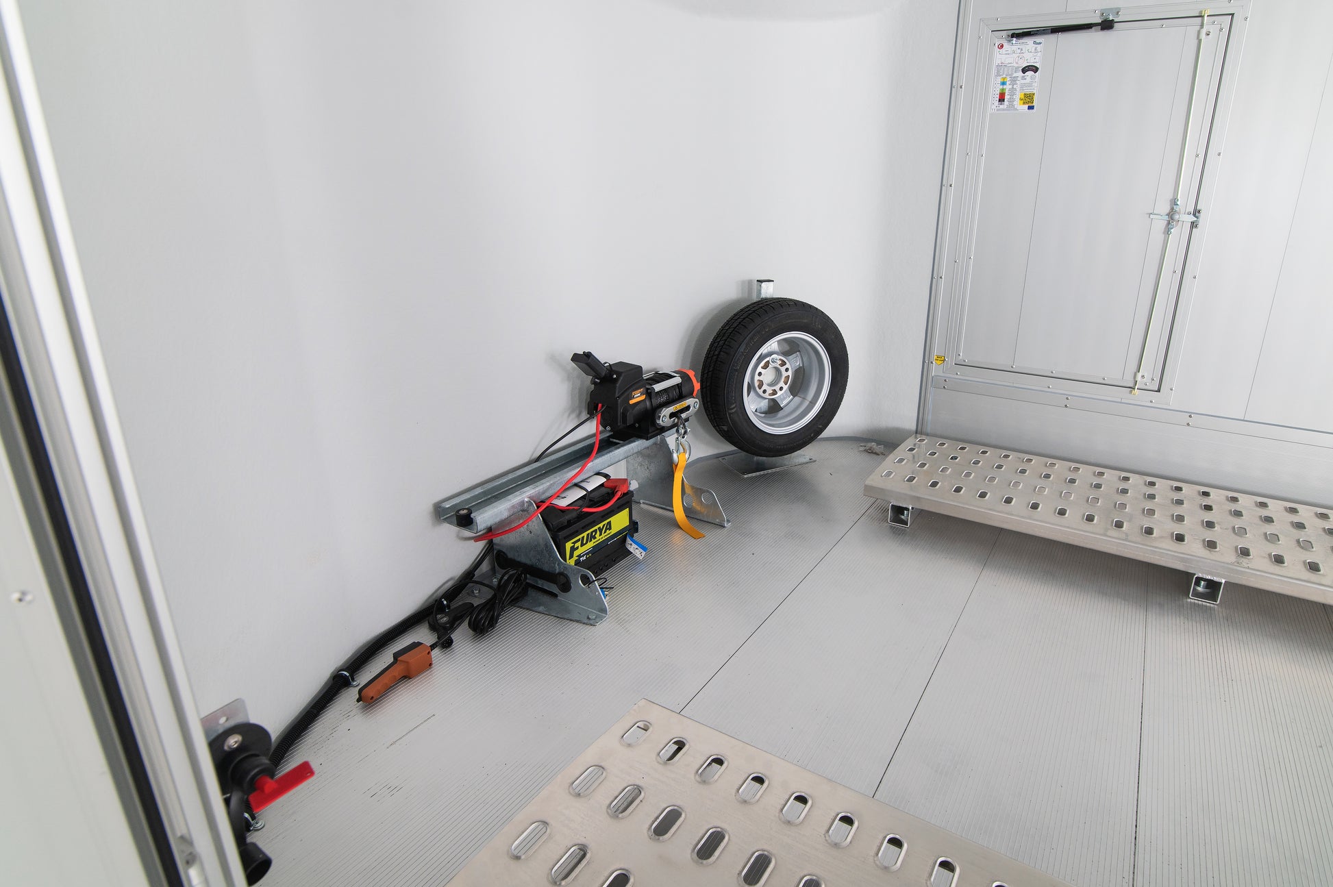 Electric winch fitted with alloy spare wheel mounted. Both optional extras