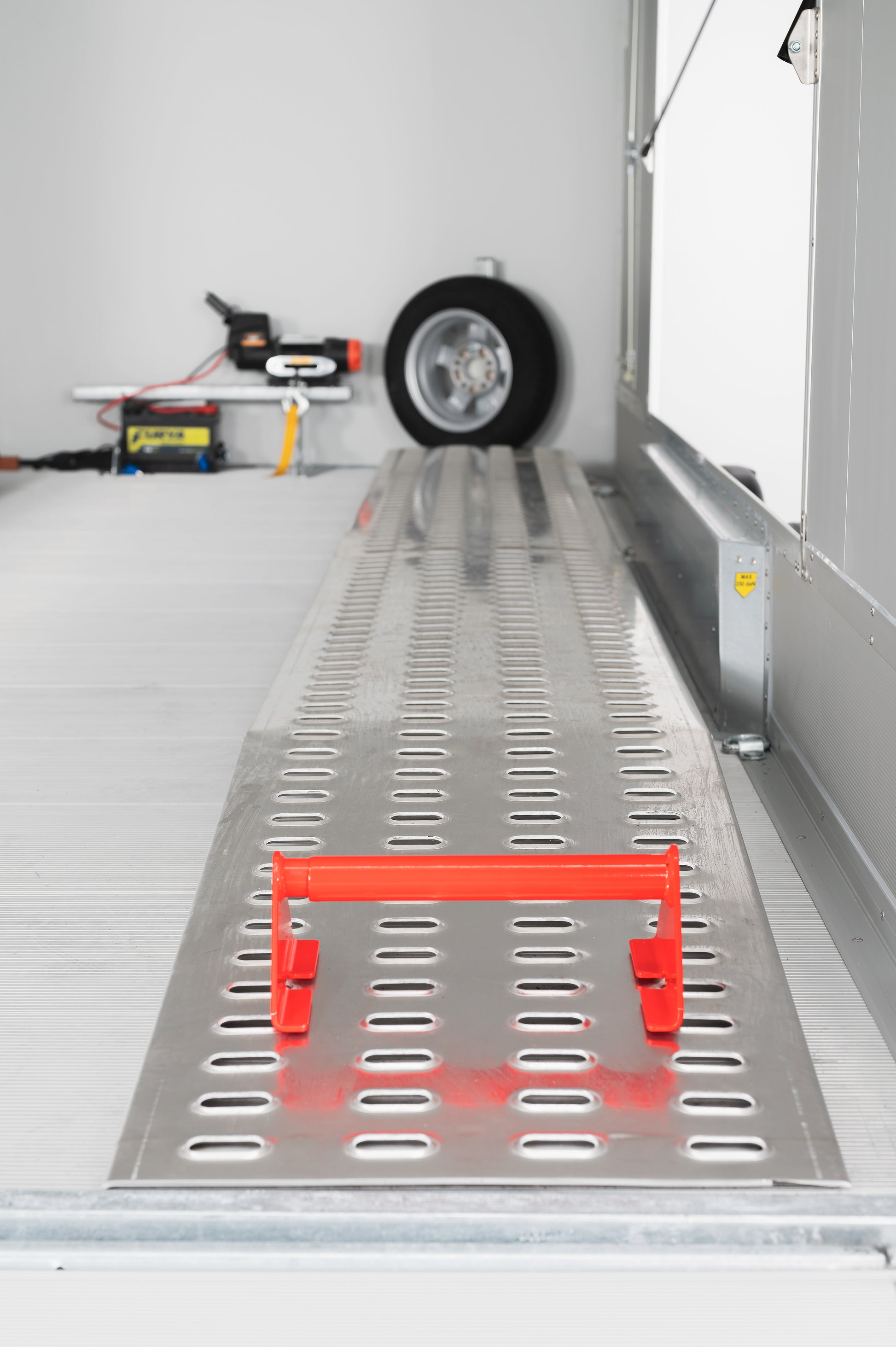 Internal loading ramps for easy securing in the Debon C2000 enclosed car transporter